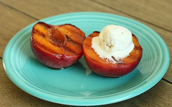 Grilled peaches with Frangelico sauce.