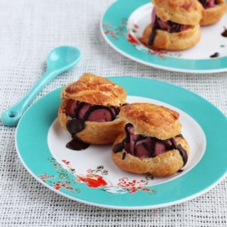Profiteroles with Raspberry Sorbet and Chocolate Sauce