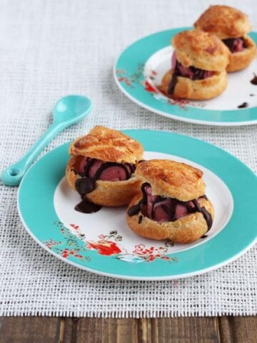 Profiteroles with Raspberry Sorbet and Chocolate Sauce