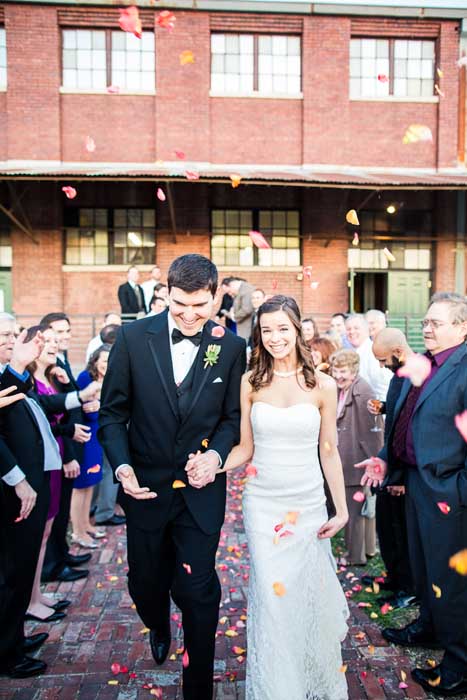 Wedding can't last forever, although we wish they could! We said goodbye as our guests threw peach rose petals.