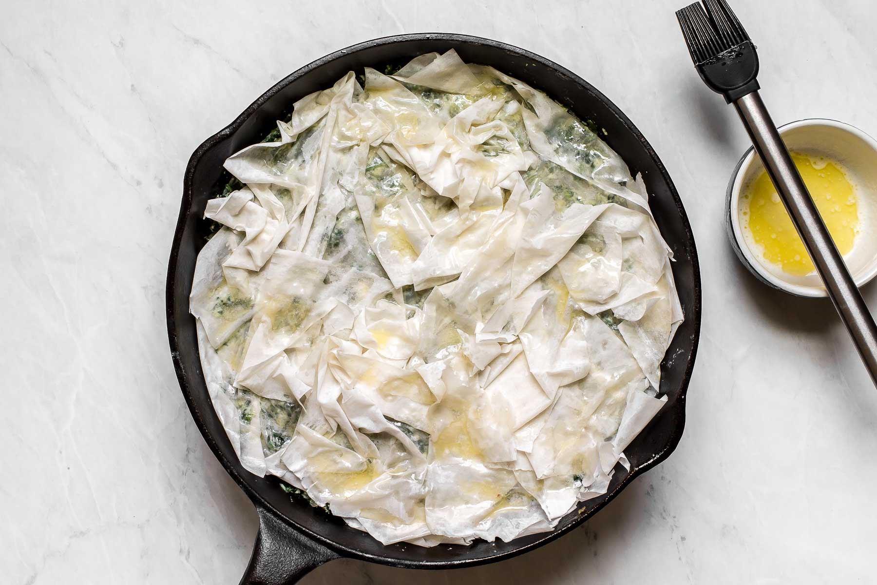 Phyllo dough on a cast iron skillet.