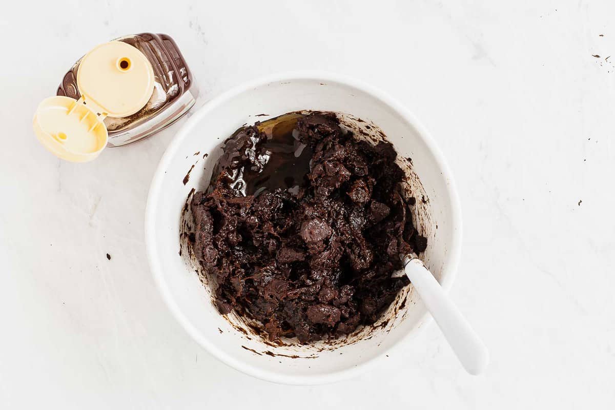Bowl of prunes, chocolate, and honey.
