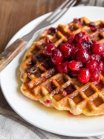 Cranberry Cornmeal Waffles + Cider Syrup