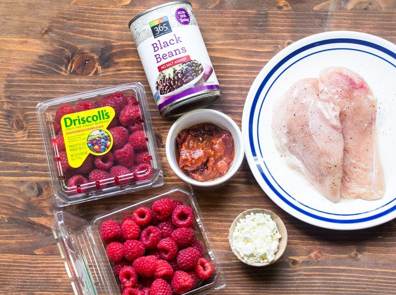 5 ingredient chicken dinner recipe: raspberry chipotle sauce over black beans and grilled chicken