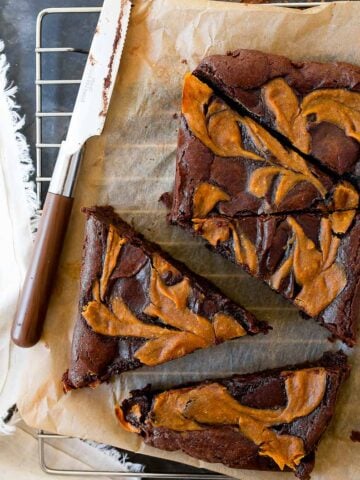 Pumpkin Swirl Brownies for two: brownies swirled with pumpkin cream cheese filling. Brownies made in a loaf pan that serve two!