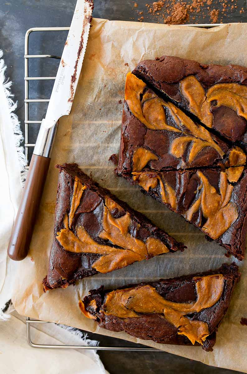 Pumpkin brownies for two: brownies swirled with pumpkin cream cheese filling. Brownies made in a loaf pan that serve two!