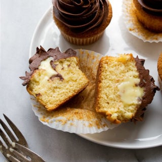 Pastry cream filled cupcakes with chocolate ganache frosting
