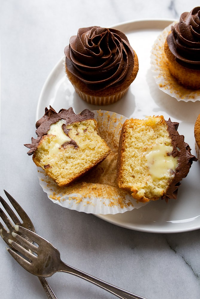 Pastry cream filled cupcakes with chocolate ganache frosting