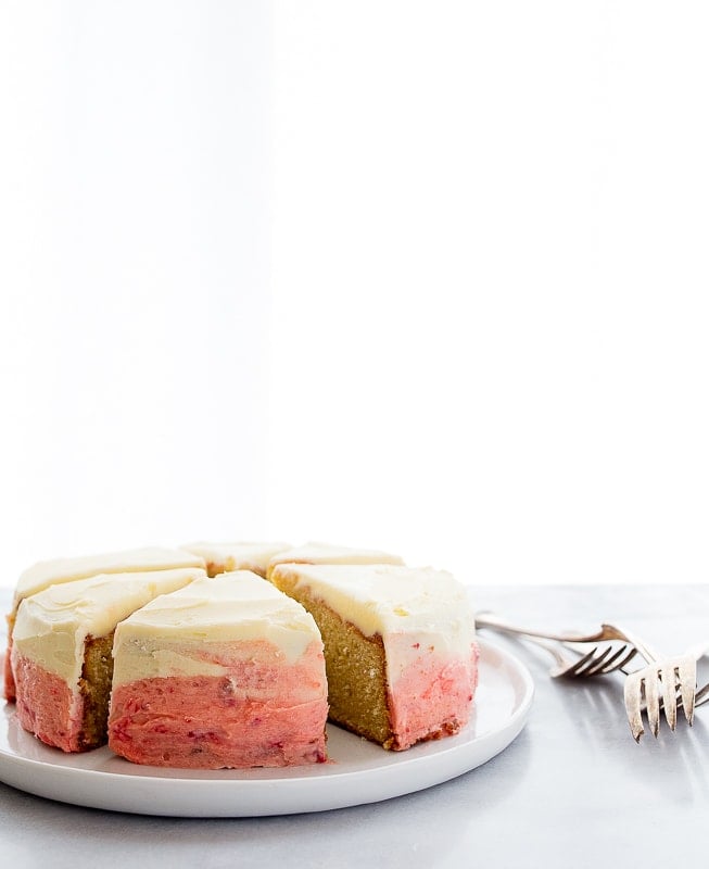 Mini strawberry ombre cake recipe made in a 6" cake pan.