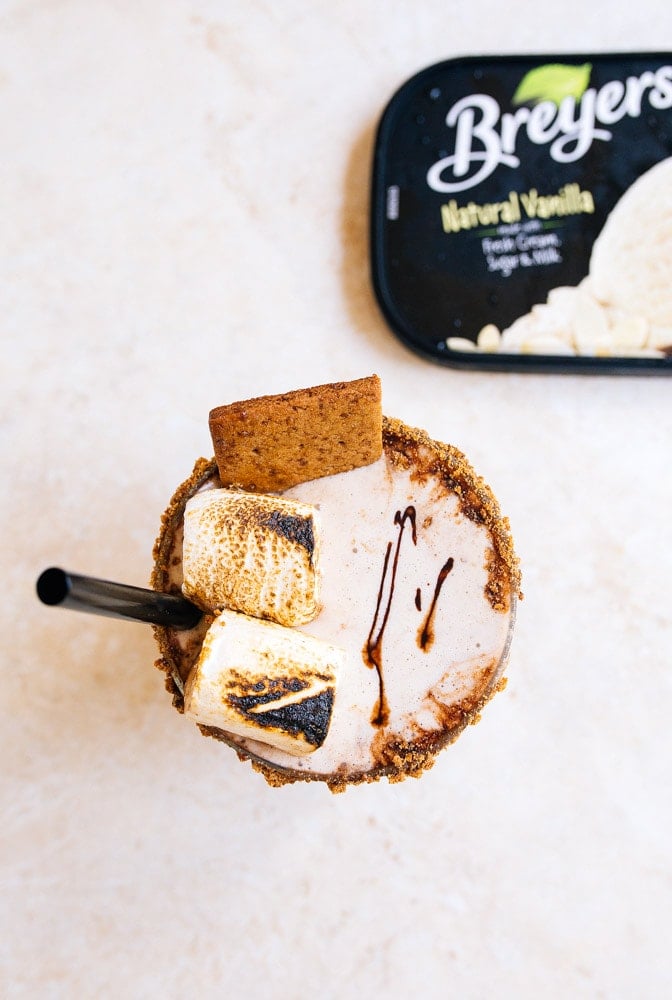 S'mores Milkshake for Two using ice cream, graham crackers, chocolate sauce, and oven toasted marshmallow s'mores.