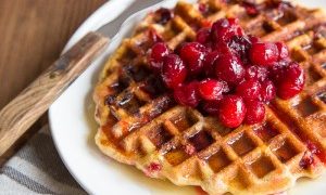 Cranberry Cornmeal Waffles + Cider Syrup
