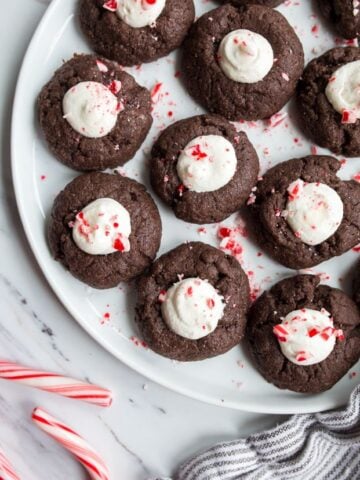 chocolate thumbprints with marshmallows and candy canes