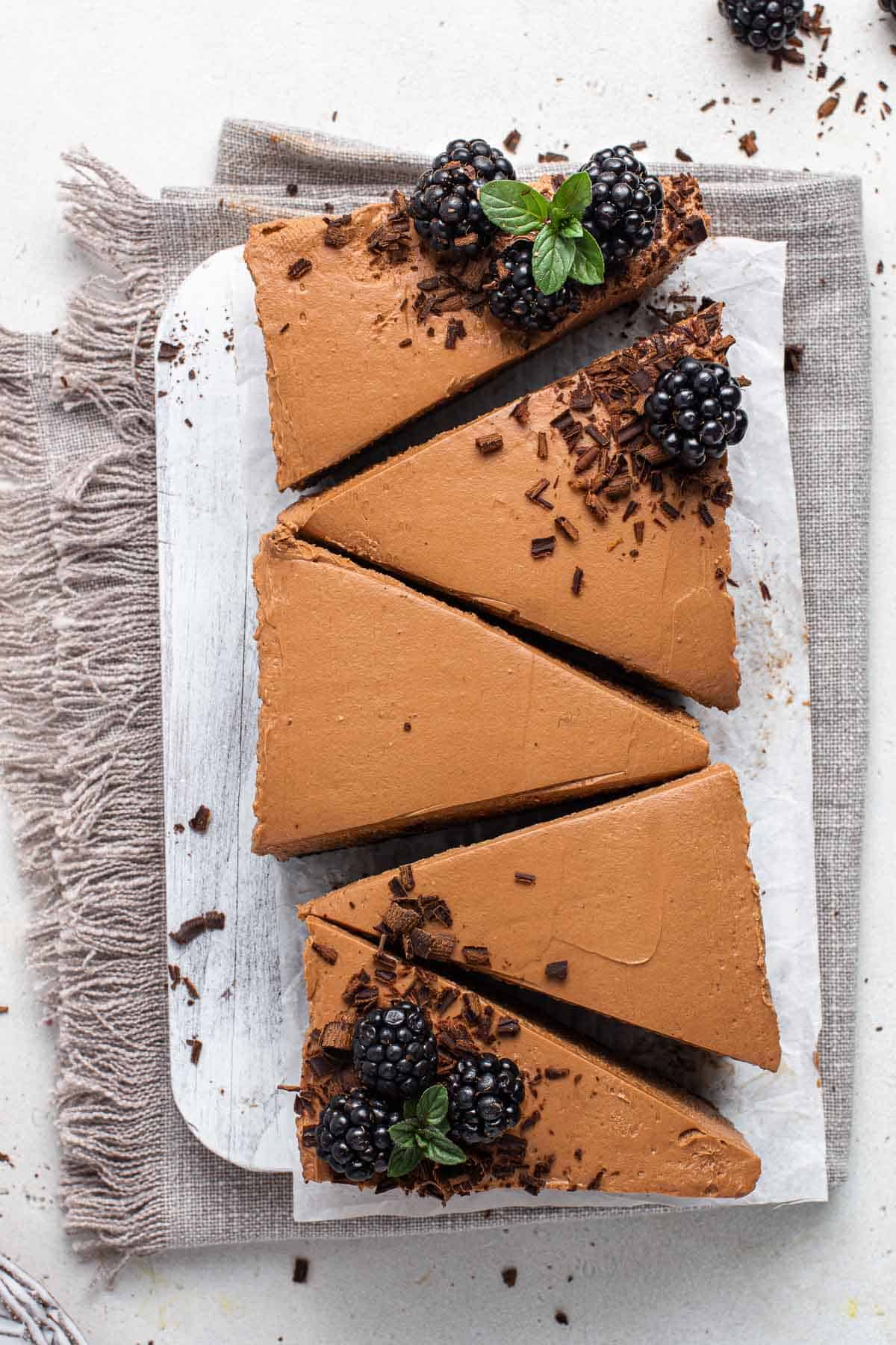 No bake chocolate cheesecake in a loaf pan sliced.