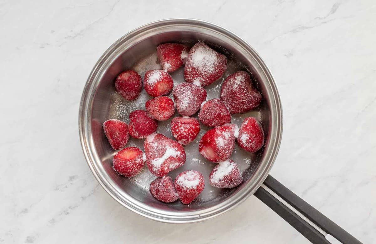 Strawberries in a small pan.