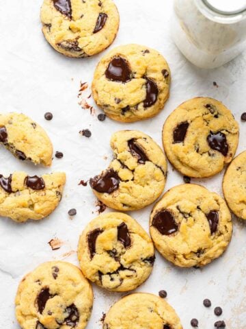 Chocolate chip cookies without brown sugar on a white table.