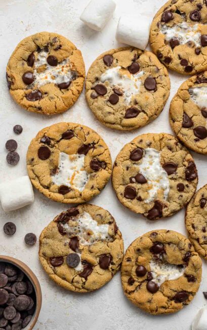 Cookies on a plate with chocolate chips and marshmallows.