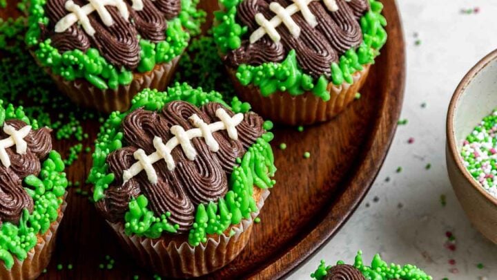 Football cupcakes with green grass.