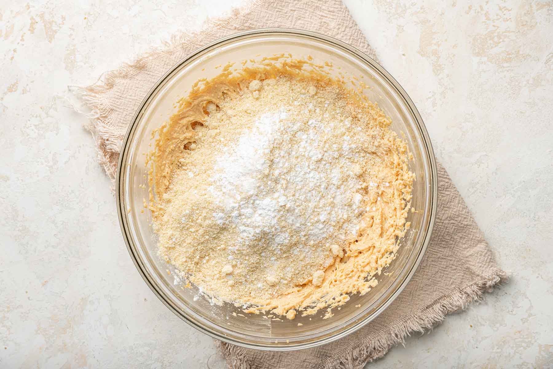 Mixing bowl with almond flour and baking powder.
