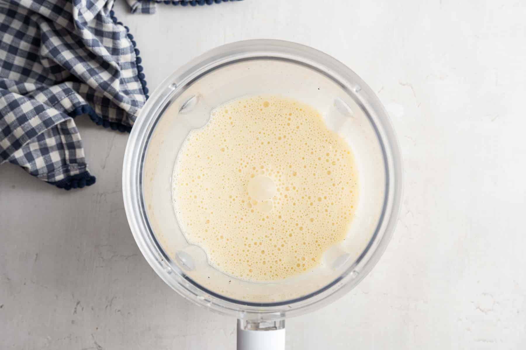 Yellow banana milkshake smooth in a blender.