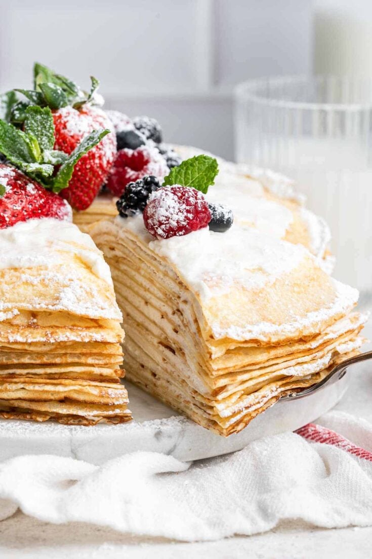 Delicious dessert crepes with pudding 