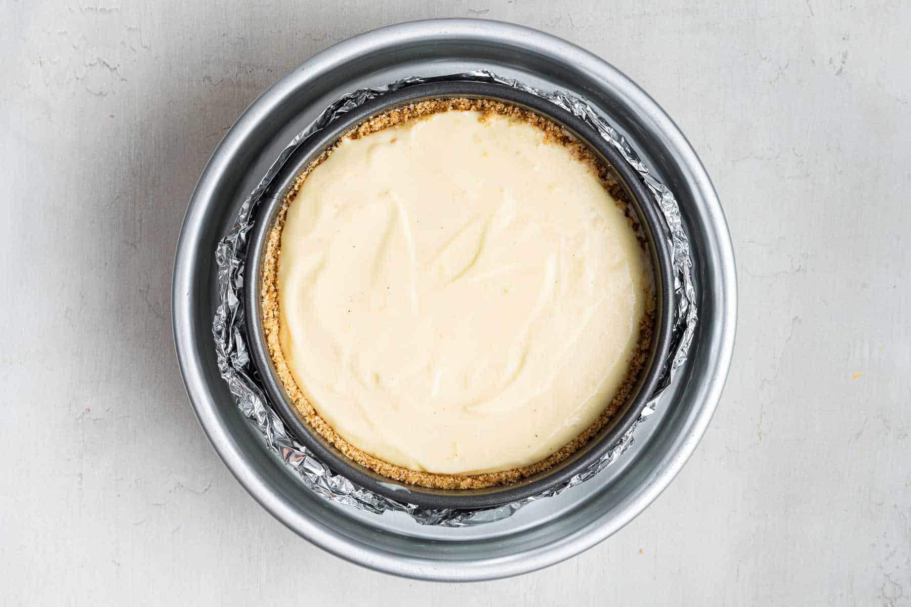 A 6 inch cheesecake recipe in a round pan with a water bath.