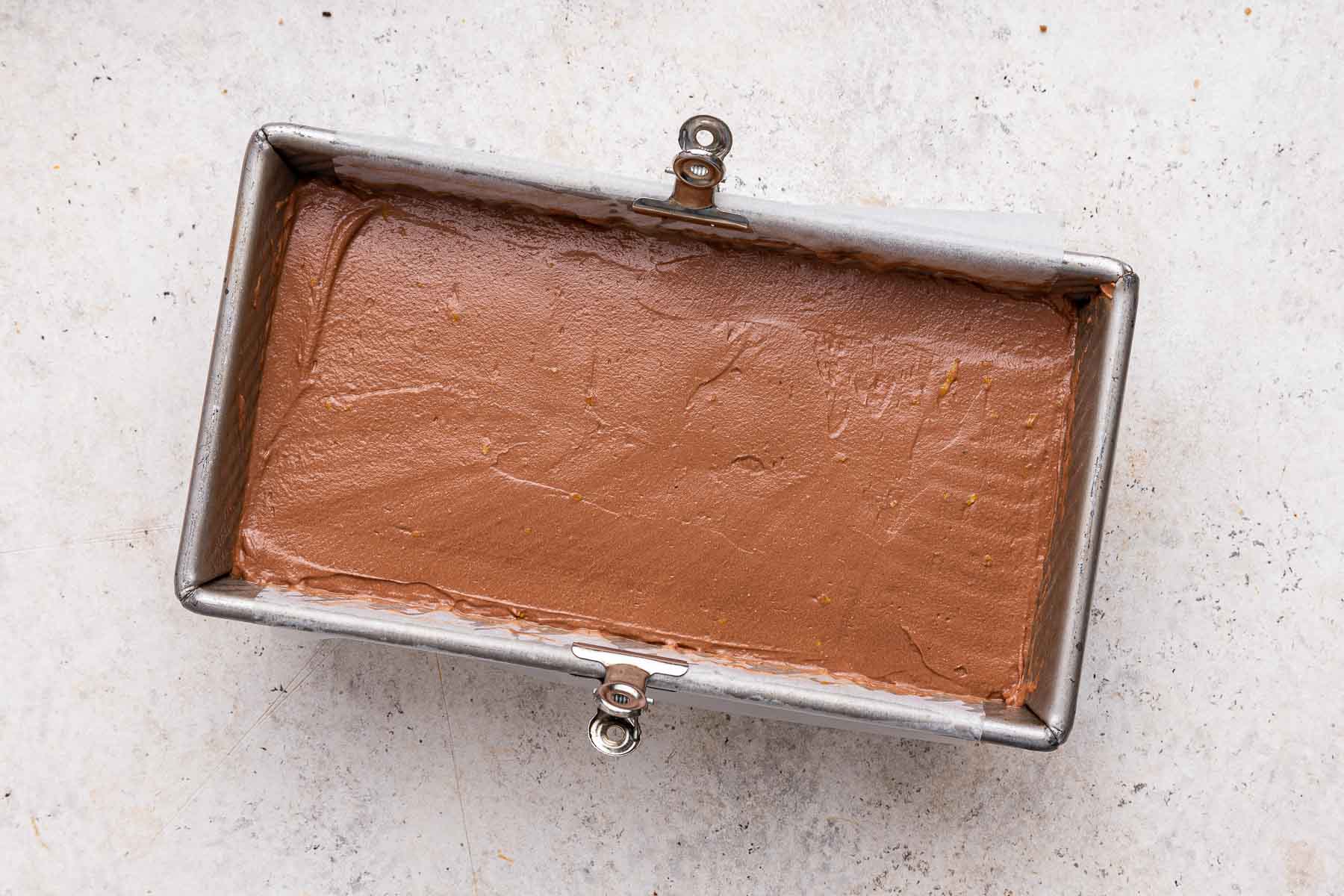No bake chocolate orange cheesecake in a loaf pan.